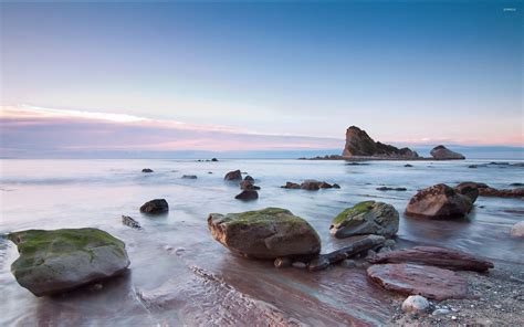 Mossy Rocks On The Beach At Sunset Wallpaper Beach Wallpapers 48015