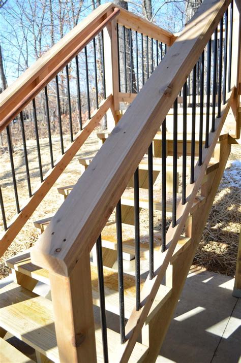 Made of quality western red cedar and black aluminum balusters, your new stylish railing will be the talk of the neighborhood. deck rail-cedar w/ aluminum spindles | Exterior stairs ...
