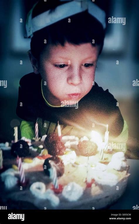 Birthday Boy Blowing Out Candle Hi Res Stock Photography And Images Alamy