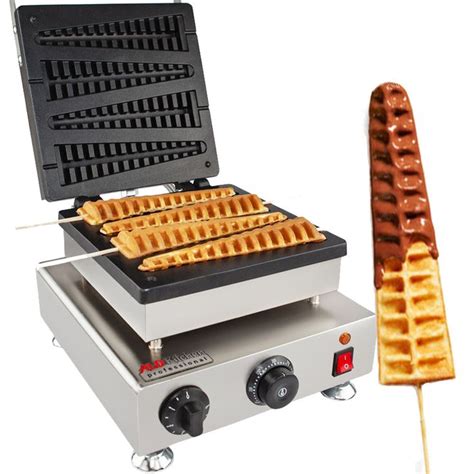 Two Waffles Being Cooked On A Griddle With A Skewer Next To Them