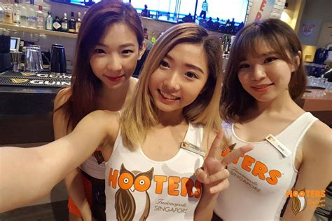 hooters waitresses in asia told to wear more clothes