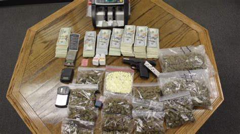 4 arrested after drugs gun money seized from magnolia home