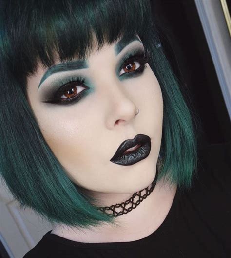To balance out the bold red on your lips, avoid going overboard with eye makeup. Instagram @dreronayne | black lipstick makeup, black lips ...