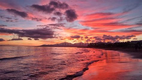 Beautiful Bright Red Sunset Over The Atlantic Ocean In