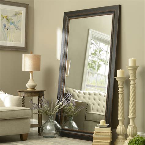 Using multiple mirrors in your living room is another way to open up the decorative possibilities at home. Enjoy this stunning 46x76 Black Framed Mirror for your ...
