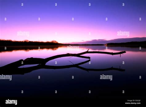 A Beautiful Sunrise Over A Lake Stock Photo Alamy