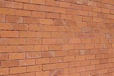 Traditional Brick Wall Texture With Orange Color Bricks In Varying
