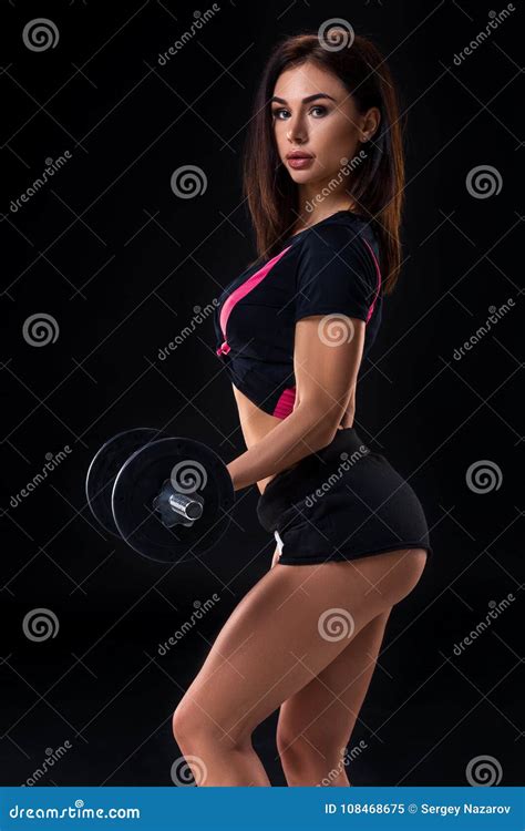 Fit Body Of Beautiful Healthy And Sporty Woman With A Dumbbells Slim