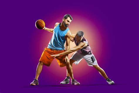 Colourful Professional Basketball Players Isolated Over Purple