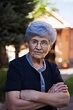 "Portrait Of An Old Woman With Glasses An White Hair Looking At Camera ...