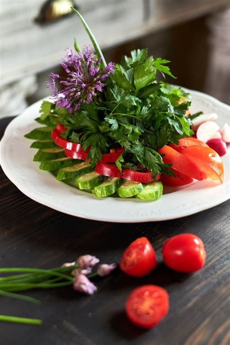 Fresh Salad Of Tomatoes Cucumbers Peppers Arugula And Dill  Stock