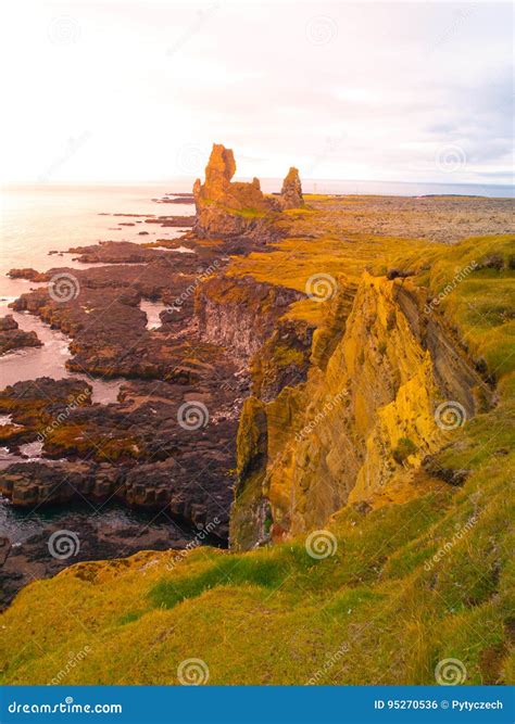 Londrangar Rock Lava Formation In The Sea Eroded Basalt Cliffs In The