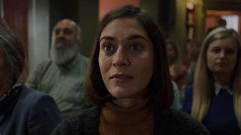 lizzy caplan on that shocking castle rock finale and finding annie s laughing place