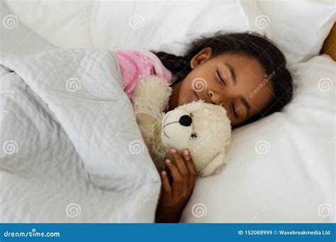 Girl Sleeping With Teddy Bear In Bed In Bedroom Stock Image Image Of