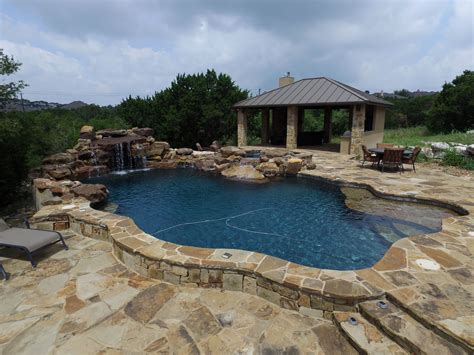 Freeform With Moss Rock Waterfall Large Flagstone Deck And Outdoor