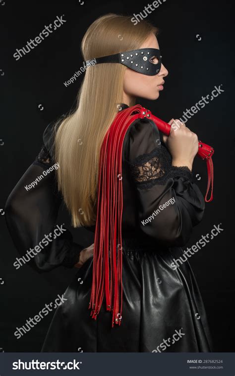 Girl With Red Leather Whip And Mask Bdsm Stock Photo Shutterstock