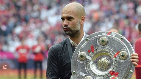 Pep Guardiola Soaked In Beer As Bayern Munich Celebrate Third Straight