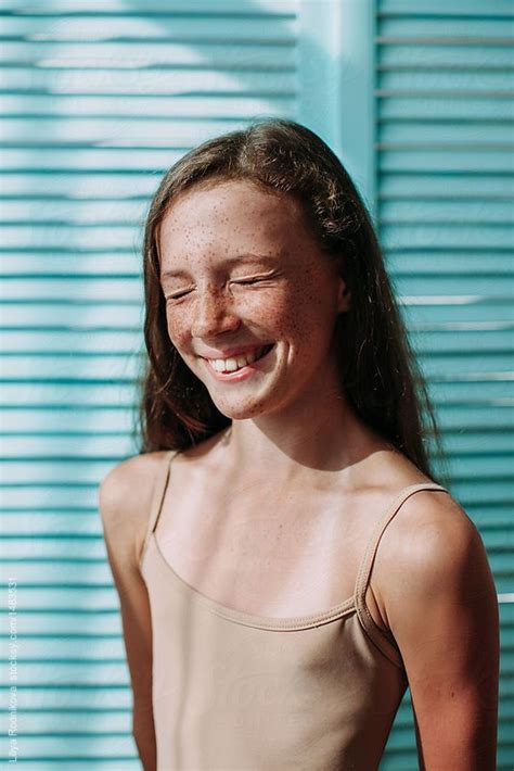 Girl Laughing With Closed Eyes With Freckles And Bright Personality By Liliya Rodnikova
