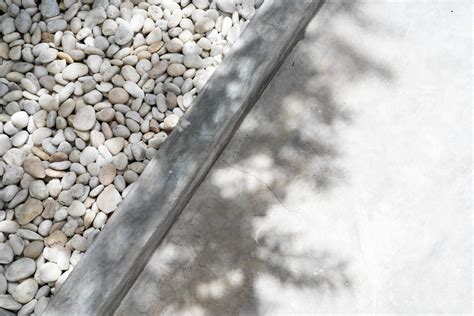 White Pebble Stone Texture On The Ground The Pebbles Closely Stone