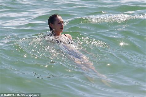 Dylan Penn Topless As She Applies Sun Cream While Enjoying Holiday In