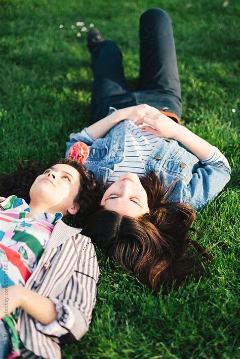 Two Female Friends Having A Good Time In A Park By Stocksy Contributor Mak Female Friends