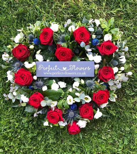 Shop high quality funeral wreaths. Funeral Loose Open Red Rose Heart - Perfect Flowers