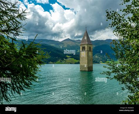 Italy The Bell Tower In Reschen Lake Stock Photos And Italy The Bell