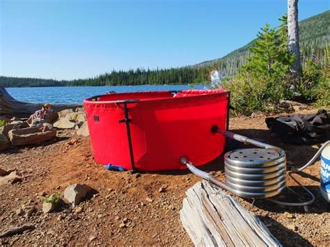 Nomad Collapsible Hot Tub Makes It Easy To Soak On A Warm Bath In The Outdoors Hot Tub Outdoor