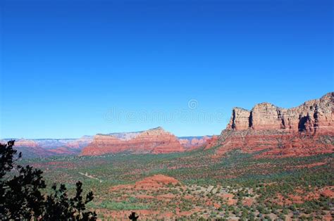 The Mountainous Landscape Of Sedona Arizona With Mountains Stretching