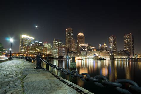 Boston At Night From Harborwalk Near Boston Harbor In Boston Night