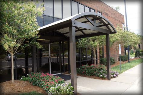 Lawrence fabric & metal structures custom commercial fabric/metal awnings and canopies. DAC Architectural Fabric & Metal Entrance & Drop-Off Canopies