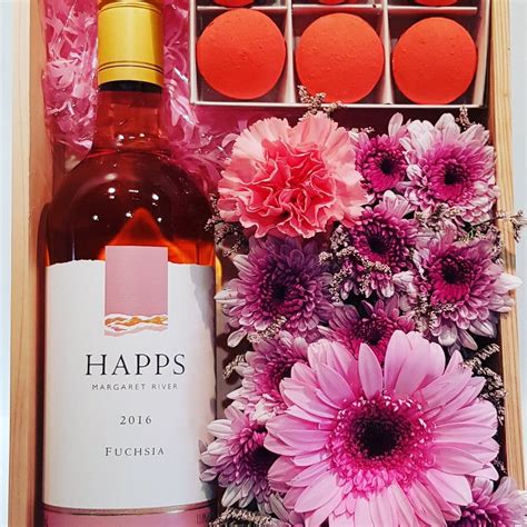Same day auckland gift delivery is available for all our gift baskets, flowers, fruit and cheese hampers and cupcakes. Wine and flowers | Wine bottle, Gourmet gift baskets, Rosé ...