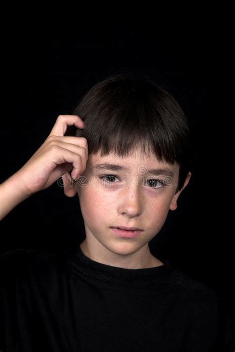 Boy Scratching His Head Stock Photo Image Of Confident 2962954