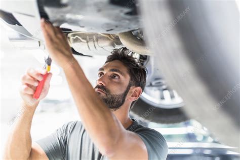 Focused Mechanic Working Under Car Stock Image F0211824 Science
