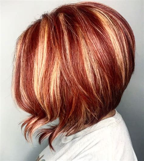 Layered Asymmetrical Copper Red And Blonde Bob Haircut By Candee Nicole