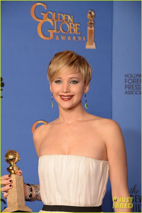 Jennifer Lawrence Shows Off Her Golden Globe In Press Room Photos