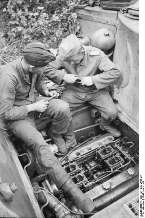 Photo German Tanker Performing Maintenance On A Tiger I Heavy Tank