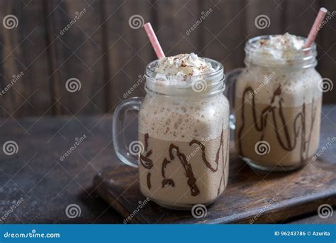 Cold Coffee Drink Frappe Frappuccino With Whipped Cream And Straws