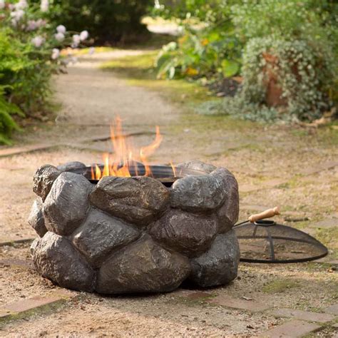 Or you could buy one of you will use about 30 bricks. Faux Rock Fire Pit With Spark Guard