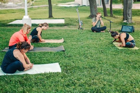 Caucasian Women Doing Yoga In Park Outside On Sunset Stock Image Image Of Active Healthy