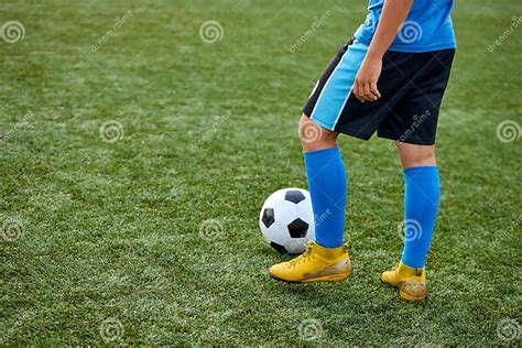 Kid Boy Kicking Soccer Ball On Sports Field Stock Image Image Of