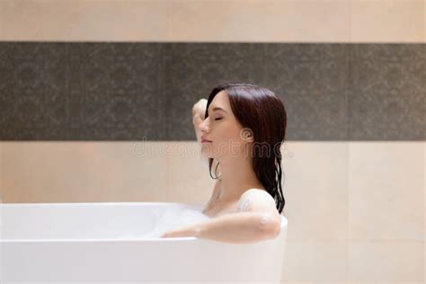 Beautiful Brunette Woman Relaxing In Bathtub Stock Image Image Of Lady Caucasian 67093015
