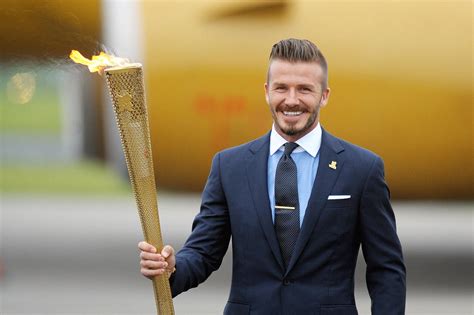 Download David Beckham Waves The Flag For Great Britain At The 2012