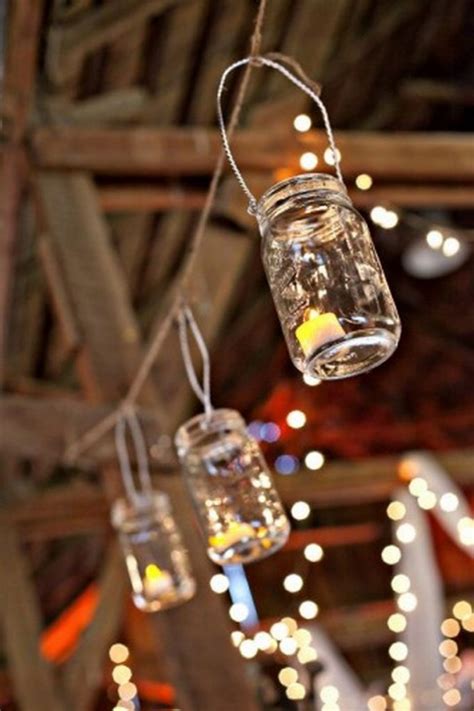 Create a traditional scene with rustic bales of hay covered in gingham blankets or hessian. DIY Mason Jar Lantern | The Owner-Builder Network
