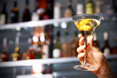 Holding Drink In Hand Stock Photo Image Of Olive Club 12533732