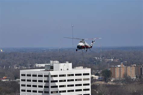 Helicopter Flying Over Building Free Stock Photo Public Domain Pictures