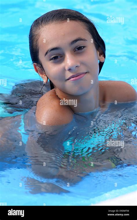 Nice Girl Swims In Pool Stock Photo Alamy