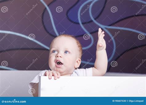 Open Eyed Baby Boy In His Bed Open Mouthed Blue Eyed Infant Kid In A