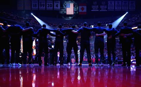 La Clippers Players Lock Arms During National Anthem