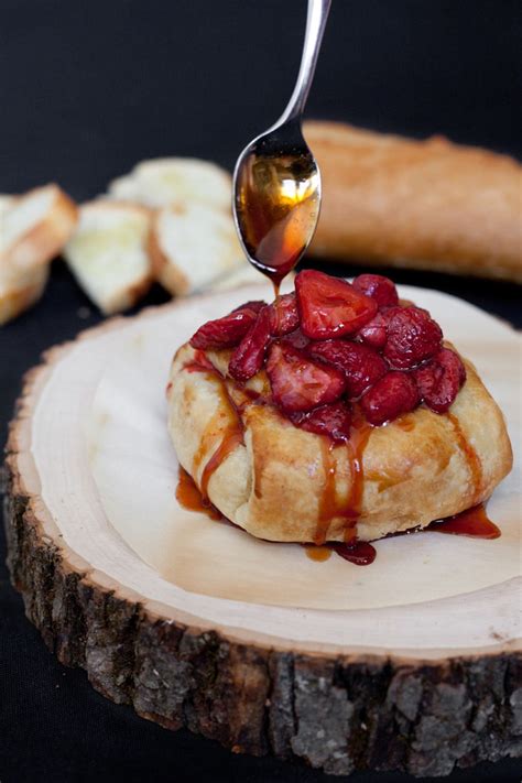 I have such vivid memories of this baked brie. Baked Brie with Roasted Strawberries